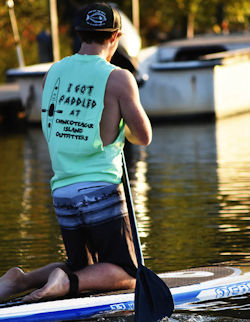 Young man on paddle board
